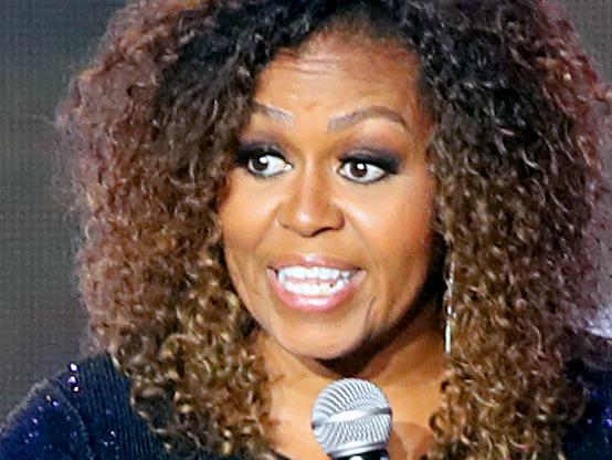 NEW ORLEANS, LOUISIANA - JULY 06: Michelle Obama speaks onstage during the 2019 ESSENCE Festival Presented By Coca-Cola at Louisiana Superdome on July 06, 2019 in New Orleans, Louisiana. (Photo by Bennett Raglin/Getty Images for ESSENCE)