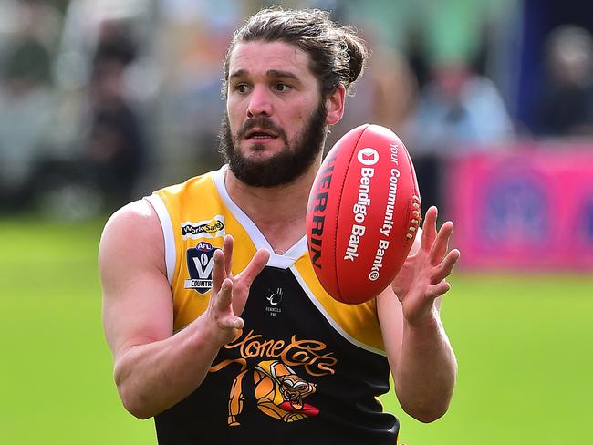 Pictured is the Peninsula Football Netball League qualifying final of Australian Rules Football between Frankston YCW (yellow and black with black shorts) versus Mornington (red, white, blue with white shorts) at Frankston Park in Frankston. Kevin Lylak. Picture: Derrick den Hollander