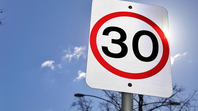 40km/h signs at the speed camera location on Exhibition Street at the Victoria Street intersection on Monday, August 10, 2015, in Melbourne, Victoria, Australia. Picture: Hamish Blair