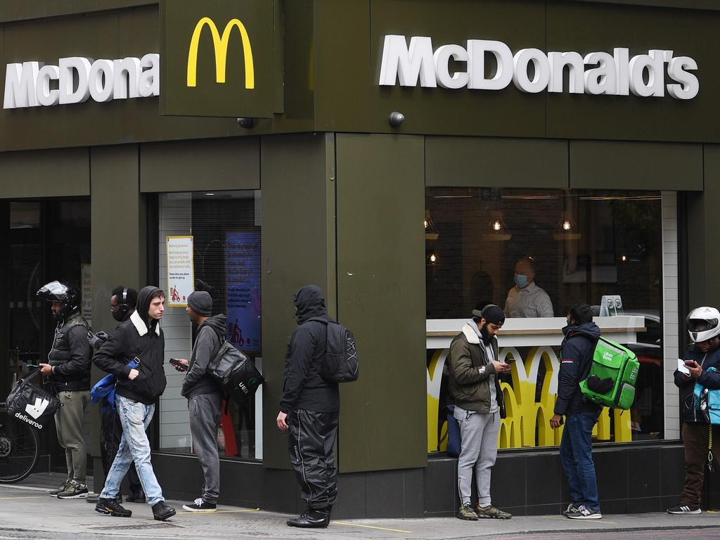 Delivery riders queue up outside a McDonald’s restaurant in East London on May 13. Picture: Daniel Leal-Olivas/AFP