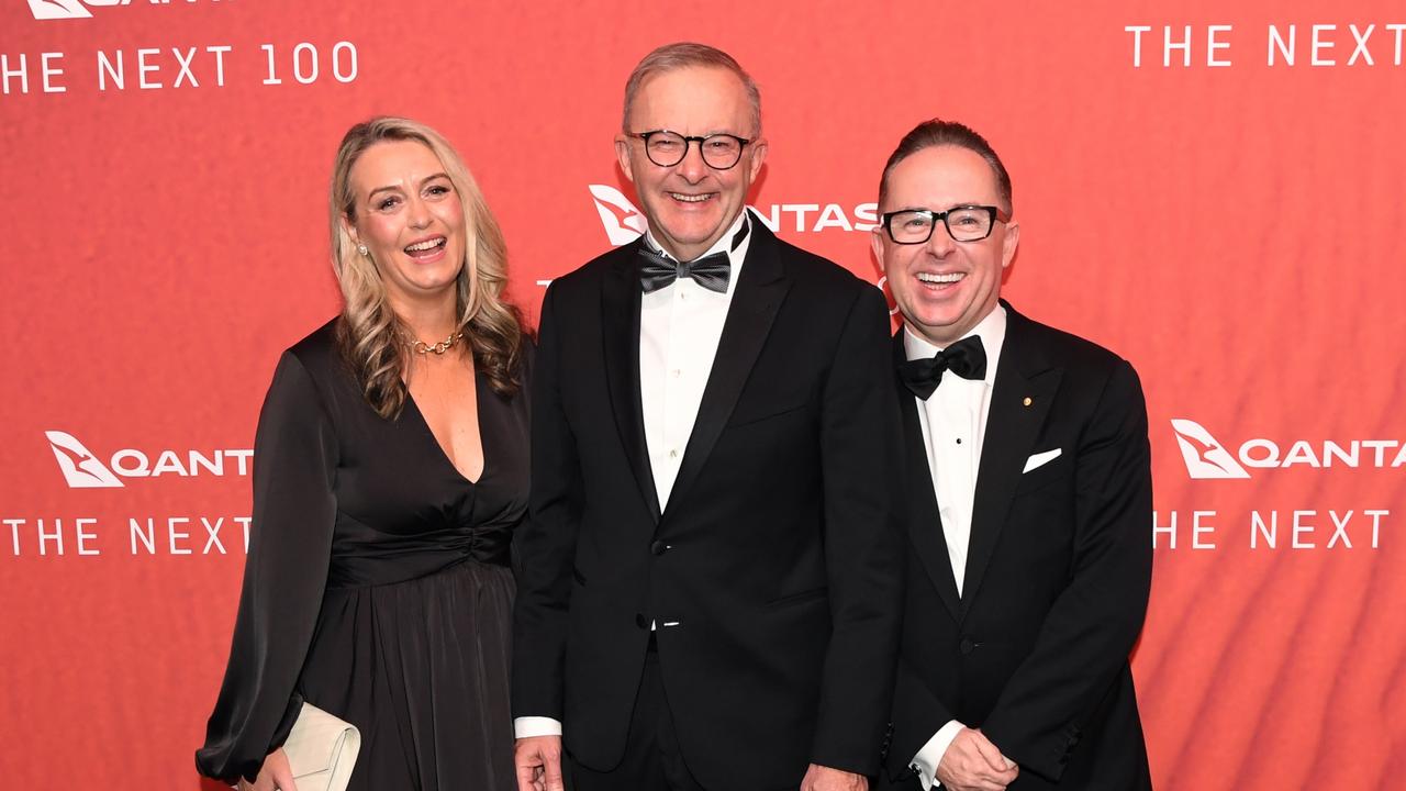 Anthony Albanese (C) stands with his partner Jodie Haydon and Qantas CEO Alan Joyce as they attend the Qantas 100th Gala Dinner in 2023. (Photo by James D. Morgan/Getty Images)