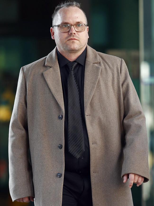 James McLeod leaves the Brisbane Magistrates court after attending the inquest into the death of his wife and four children. Picture: NCA NewsWire/Tertius Pickard