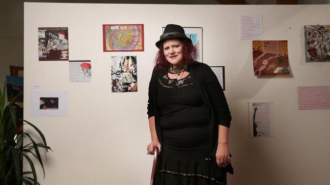 Joanne Robinson who has experienced homelessness with her work that is part of the exhibition. I Am Someone exhibition in Hobart as part of Homelessness Week 2023. Picture: Nikki Davis-Jones