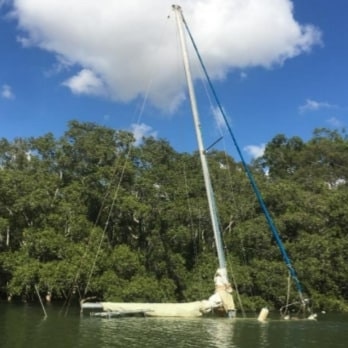 A yacht sunken in Cabbage Tree Creek. This vessel was found in early 2020 and is therefore unlikely to be the same boat, but is similarly submerged in the same area and to the same level Destiny once was. Picture supplied by Volunteer Marine Safety Brisbane.