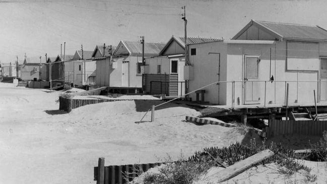 Beach shacks right on the Semaphore Park foreshore in 1970.