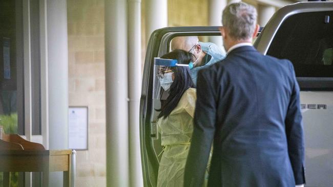 Sarah Caisip arrives at Mt Gravatt Cemetery. Picture:: Glenn Hunt