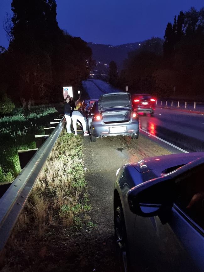 Cars pulled over on the Southern Outlet after damage to tyres from roadworks. Picture: Blair Whitehead/Facebook