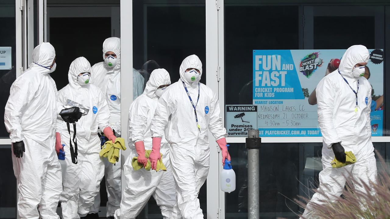 Cleaners at work at a South Australian school after a potential link to the COVID cluster. Picture: Tait Schmaal