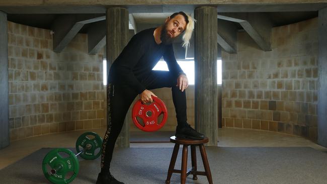 Fred works out in his downstairs gym at home. Picture: John Appleyard