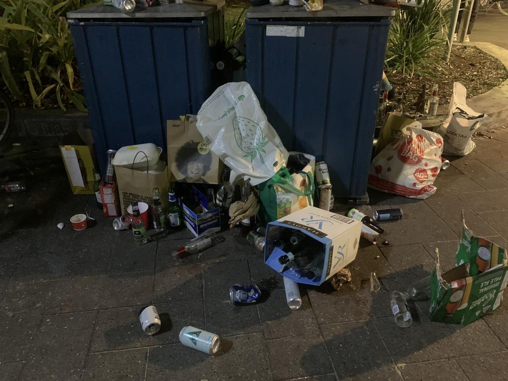 Empty alcohol containers spilling out of public bins near Manly Wharf. Picture: Pat Daley