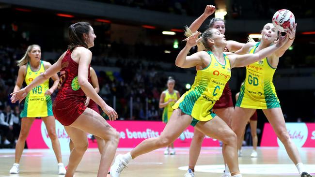 Jamie Lee Price and Joanna Weston of Australia both reach for the ball. Picture: Chloe Knott/Getty Images