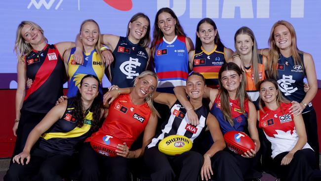 MELBOURNE, AUSTRALIA - DECEMBER 16: First round picks (Top Row L-R) Grace Belloni of the Bombers, Lucia Painter of the Eagles, Poppy Scholz of the Blues, Emma McDonald of the Bulldogs, India Rasheed of the Crows, Sara Howley of the Giants, Sophie McKay of the Blues, (Bottom Row L-R) Sierra Grieves of the Tigers, Havana Harris of the Suns, Ash Centra of the Magpies, Molly O'Hehir of the Demons and Zipporah Fish of the Swans pose during the 2024 Telstra AFLW Draft at Marvel Stadium on December 16, 2024 in Melbourne, Australia. (Photo by Dylan Burns/AFL Photos via Getty Images)