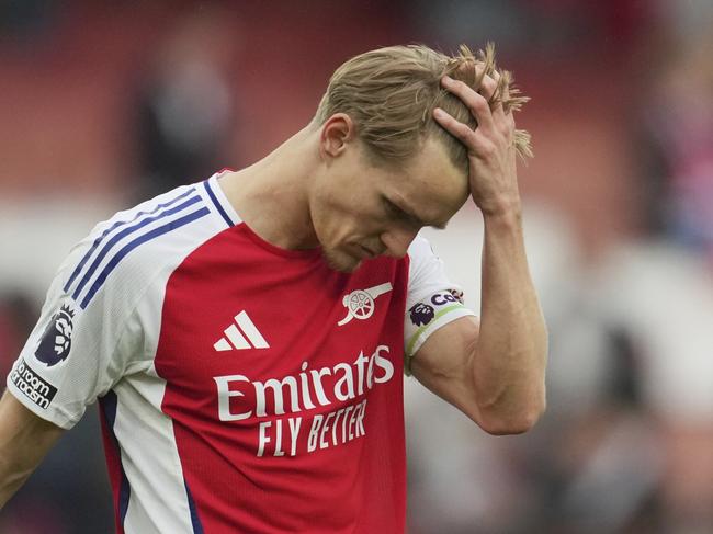 Arsenal's Martin Odegaard leaves the field at the end of the English Premier League soccer match between Arsenal and Bournemouth at Emirates stadium in London, Saturday, May 3, 2025. (AP Photo/Kin Cheung)
