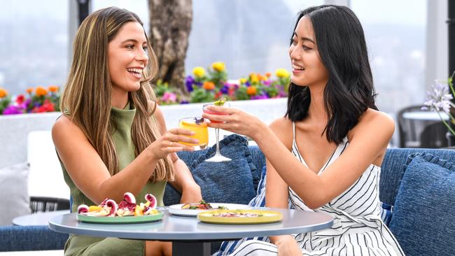 Ava Frawley (L) and Jasmine Subrata enjoy a drink at Crown Towers. Picture: James Morgan/Getty Images