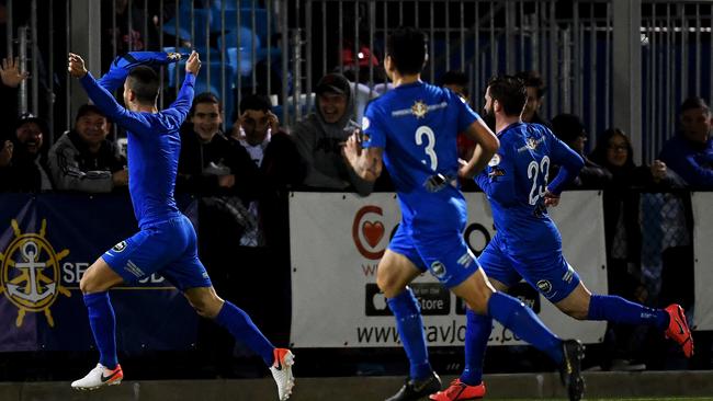 Fausto Erba (left) celebrates scoring the goal to put Adelaide Olympic 3-2 ahead, only to receive his second yellow card and get sent off moments later. Picture: Mark Brake/Getty Images