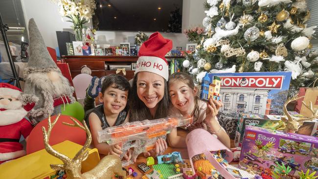 Mother-of-two Katherine Houdalakis, 43, with her children Maria, 8, and Kosta, 4. Picture: Rob Leeson