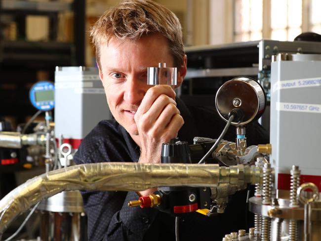 Associate Professor Martin O'Connor in the Sapphire Clock lab. Picture: Tait Schmaal