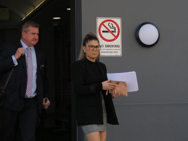 Mia Daly, 20, of Mardi, leaving Wyong Local Court with her solicitor Bred Kernick after no conviction was recorded against her. Picture: Richard Noone