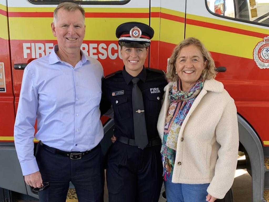 Lauren Brown and her parents Gary and Jenny after graduating as a fire fighter in 2023.