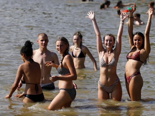 Swimmers enjoy the water at Hampstead Heath ponds as the temperature soars in London. Picture: AFP