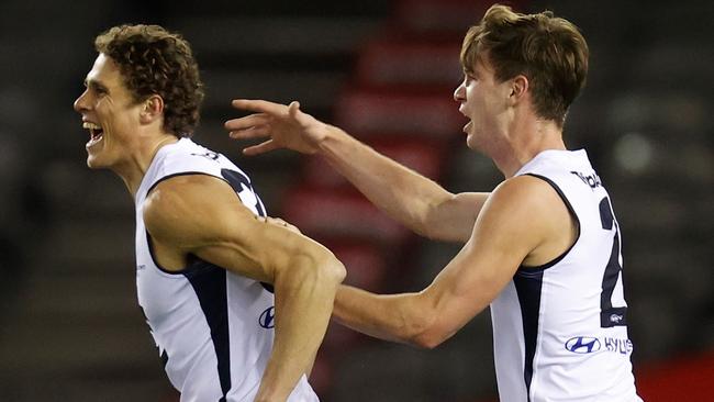 Curnow (L) returned to AFL footy in emphatic fashion. (Photo by Michael Willson/AFL Photos via Getty Images)