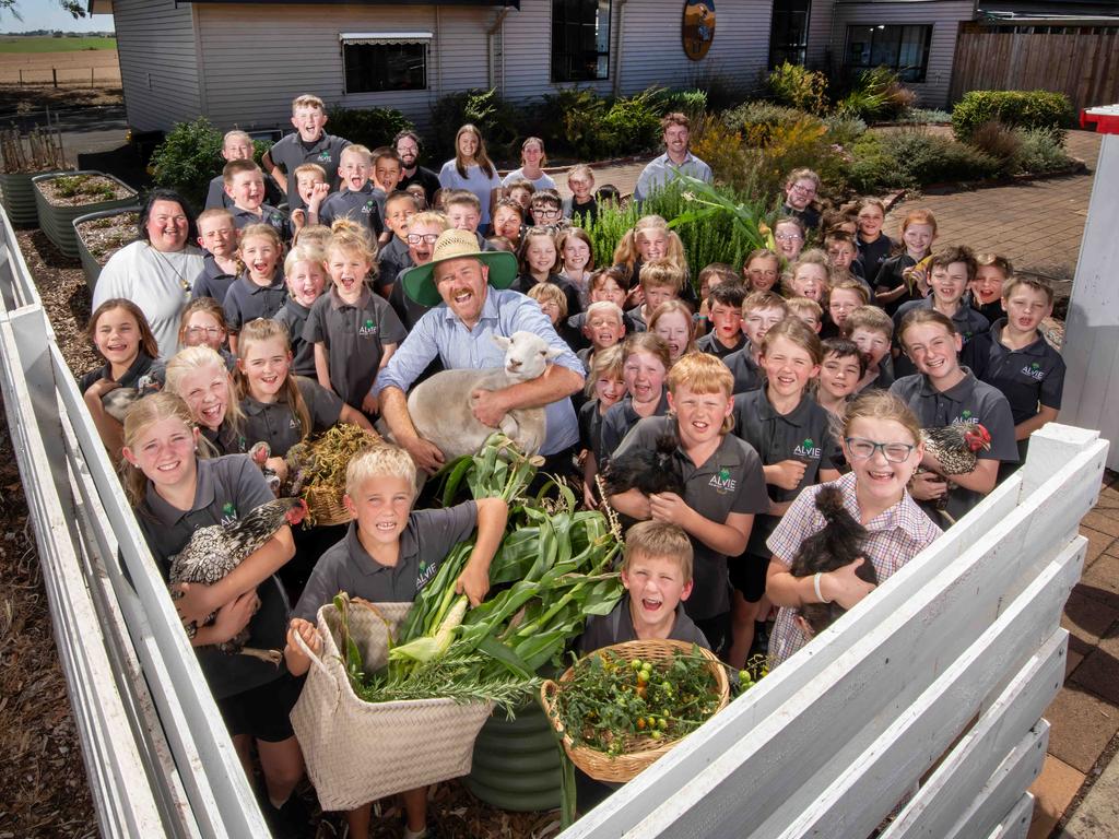 School principal Ross Dullard (with lamb) said Alvie Primary thrived on strong community involvement. Picture: Rob Leeson