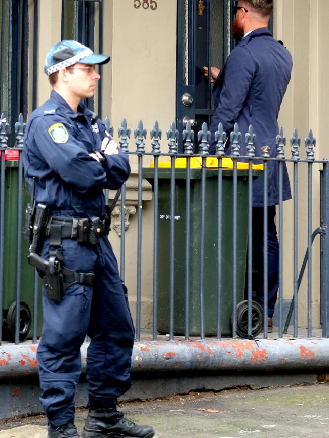 Detectives doorknock the Surry Hills area as part of the ongoing investigation. Picture: John Grainger