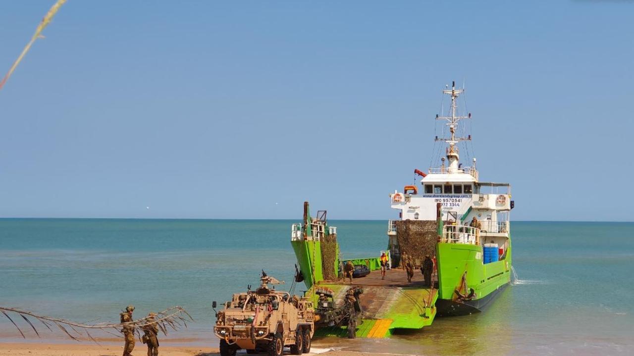 Soldiers from Darwin's 8/12 Regiment conduct littoral training on Dundee Beach, Northern Territory.