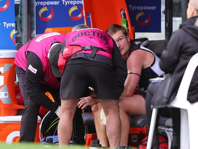 ADELAIDE, AUSTRALIA – MAY 19: Ollie Wines of the Power in the hands of Doctors on the bench during the 2024 AFL Round 10 match between Yartapuulti (Port Adelaide Power) and the Hawthorn Hawks at Adelaide Oval on May 19, 2024 in Adelaide, Australia. (Photo by Sarah Reed/AFL Photos via Getty Images)