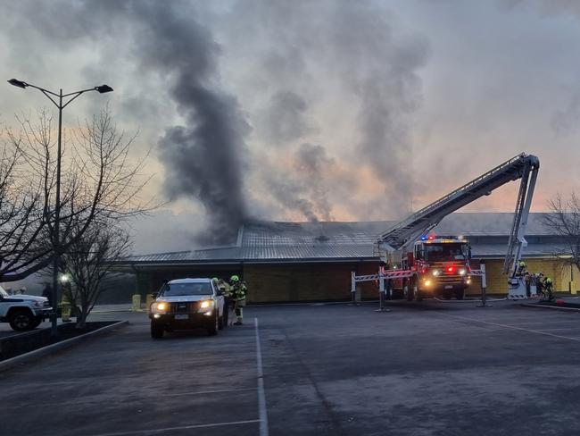 Firefighters battle to contain a fire at the Plymouth Brethren Christian Church caused by Sam Robinson.