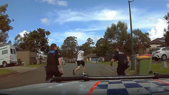 Videos released by police show the moment officers chase down teens and seize several motorbikes in an operation targeting ‘anti-social’ youth behaviour. Photo: Queensland Police