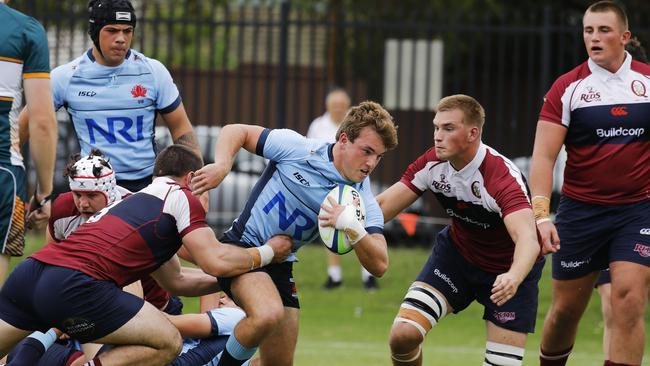 Action in the NSW Waratahs U18s battle witt the Queensland Reds. Pictures: Supplied: Karen Watson/Rugby Australia