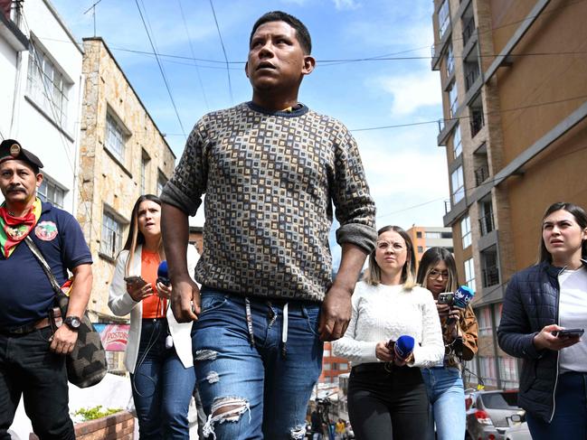 Indigenous Manuel Ranoque, centre, father of the four children who were found alive. Picture: AFP