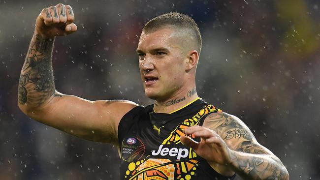 Dustin Martin celebrates on the final siren after Richmond defeated Essendon. Picture: AAP