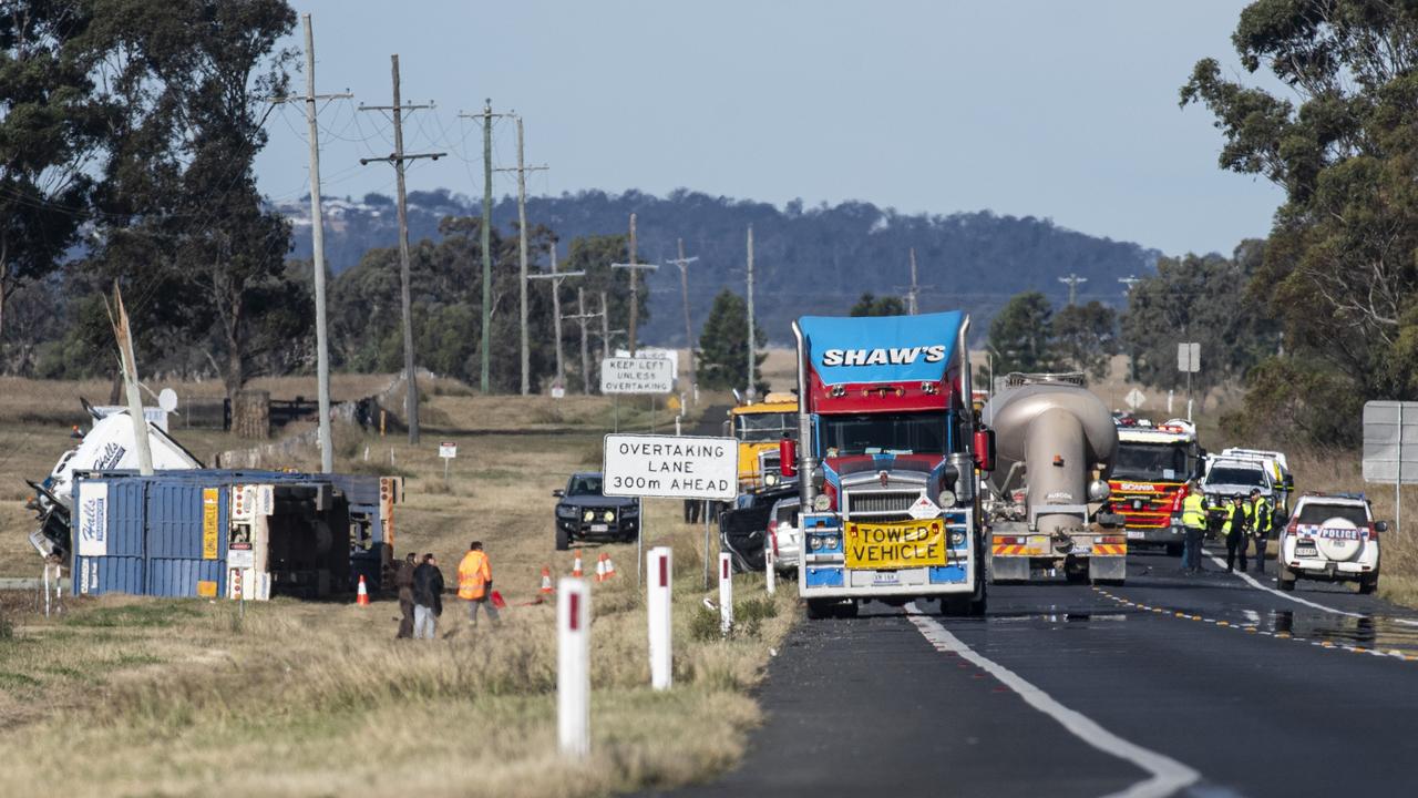 Emergency services at the scene of the fatal crash on the Warrego Highway, east of Oakey, Sunday, June 9, 2024. Picture: Kevin Farmer