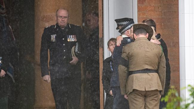 Mr Ashton at the funeral of Constable Glen Humphris, one of the officers killed in the freeway tragedy. Picture: Jason Edwards