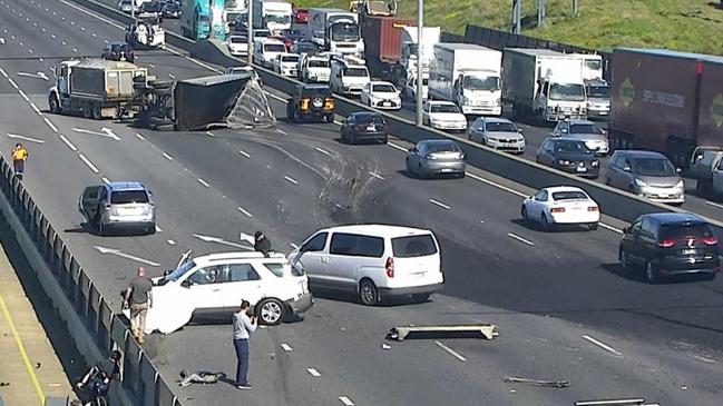 A truck rollover that scattered bitumen and closed the Western Ring Road between Airport Drive and the Calder Freeway. Picture: VicTraffic Facebook