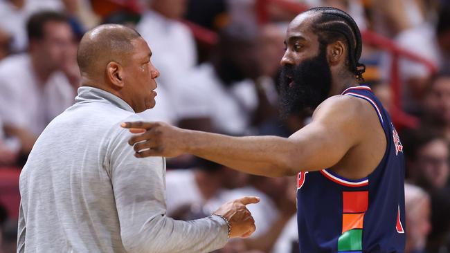 James Harden talks with head coach Doc Rivers. Photo: Michael Reaves/Getty Images/AFP.