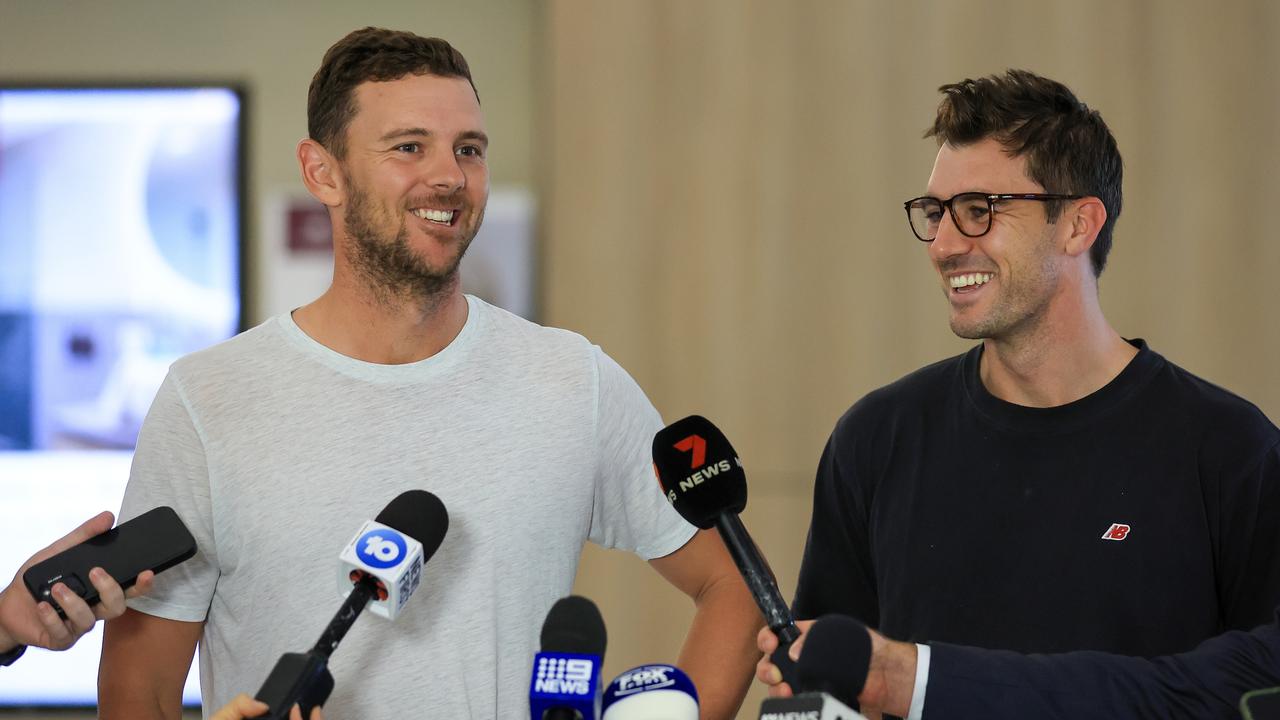 Josh Hazlewood and Pat Cummins are glad to be home. Picture: Mark Evans/Getty Images