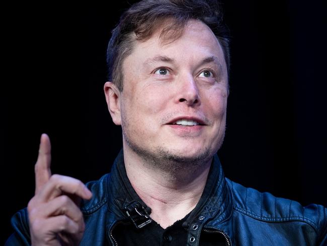 (FILES) In this file photo Elon Musk, founder of SpaceX, speaks during the Satellite 2020 at the Washington Convention Center on March 9, 2020, in Washington, DC. - Tesla began officially accepting bitcoin as currency to purchase electric autos, Chief Executive Elon Musk said on March 24, 2021 a with bitcoin," Musk said on Twitter, implementing a plan announced in February to accept the cryptocurrency as a form of payment. (Photo by Brendan Smialowski / AFP)