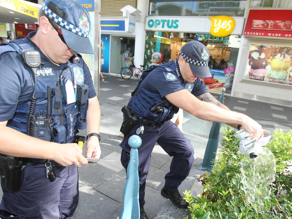 Surfers Paradise police deal with some illegal alcohol on the street. Picture Mike Batterham