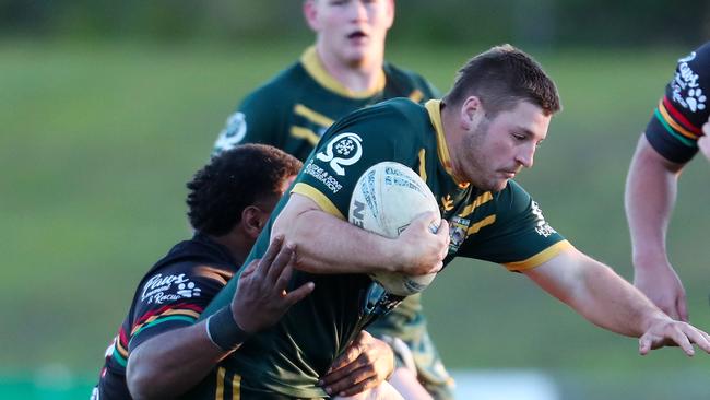 Jake O’Meley charging into the Berkeley Vale defence. Picture: Sue Graham