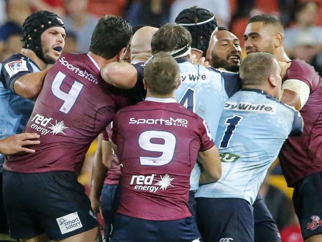 A melee breaks out during the Round 8 Super Rugby match between the Queensland Reds and the NSW Waratahs at Suncorp Stadium in Brisbane, Saturday, April 29, 2017. (AAP Image/Glenn Hunt) NO ARCHIVING, EDITORIAL USE ONLY