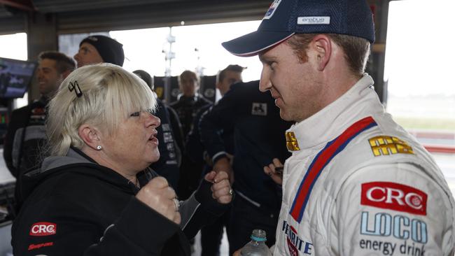 Erebus Motorsport owner Betty Klimenko chats with driver Dave Reynolds.