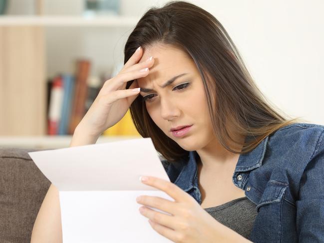 woman shocked at electricity bill generic