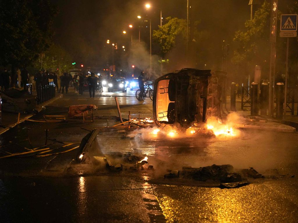 Rioting continued on Thursday night after a 17-year-old boy was shot in the chest by police at point-blank range. (Photo by Zakaria ABDELKAFI / AFP)