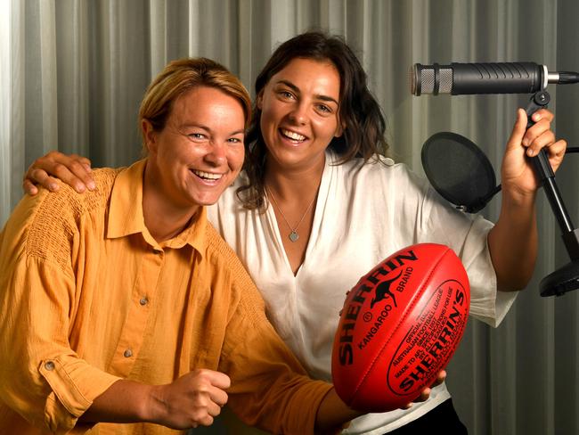 Courtney Cramey and Ebony Marinoff love talking all things footy. Picture: Tricia Watkinson