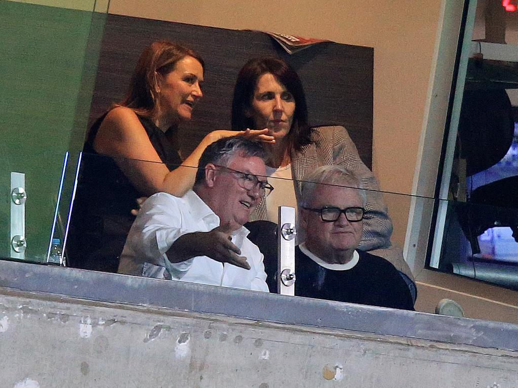 Eddie McGuire watches Friday’s AFL game with Peter Gordon.