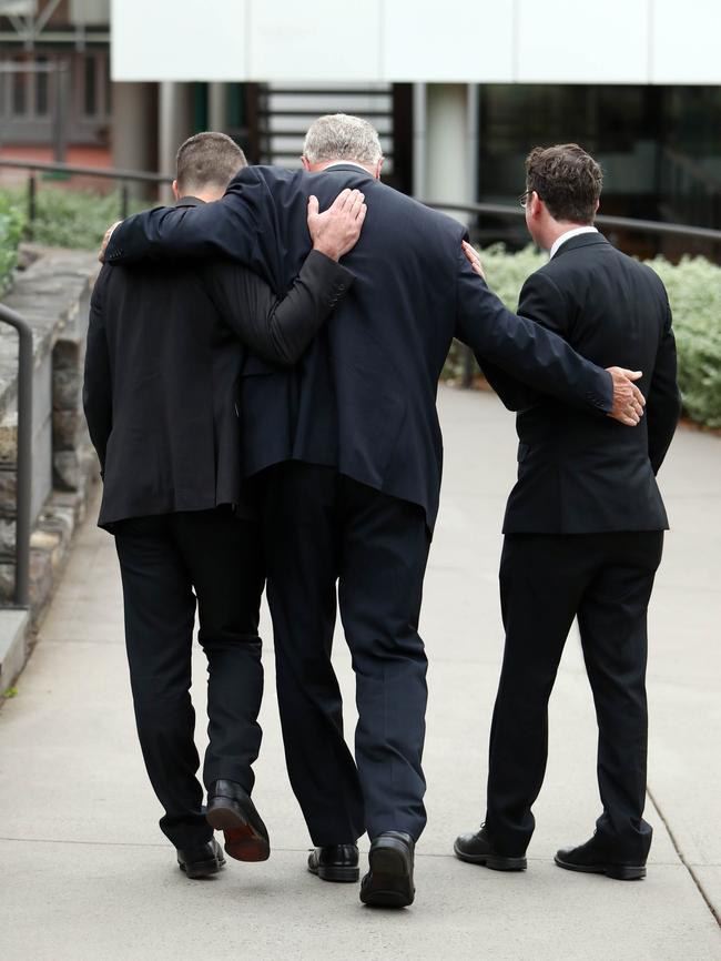 Mr Brown is greeted by colleagues on the first day back at school from holidays. Picture: The Australian