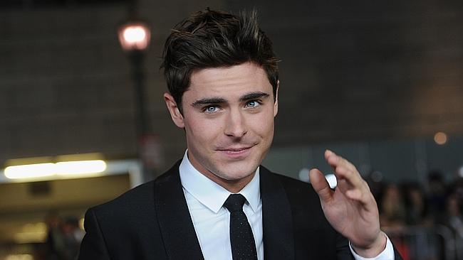 Zac Efron arrives to the premiere of "That Awkward Mo...